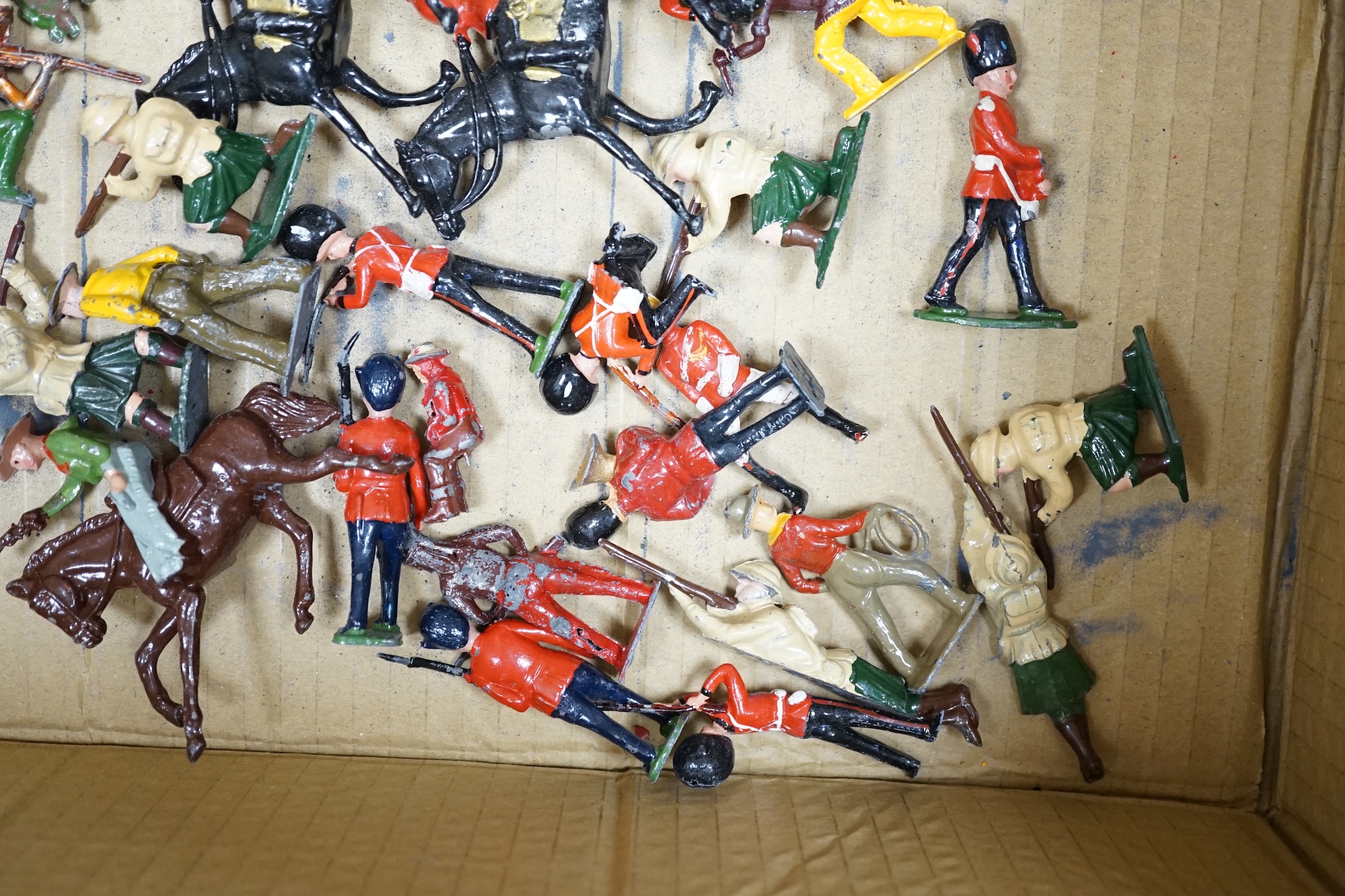 A collection of approx. fifty Britains lead soldiers, including; Cowboys and Indians, Bandsmen, Grenadier Guards, etc.